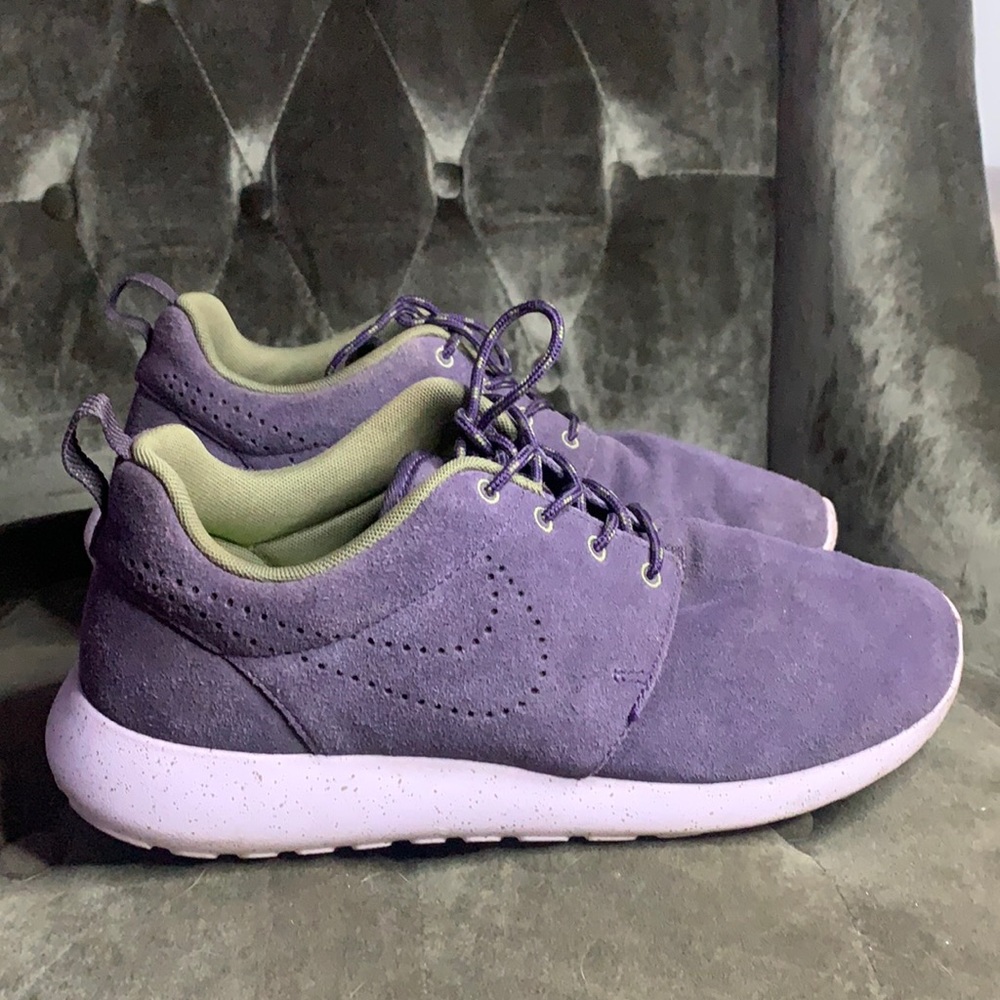 Nike purple suede sneakers. Never worn them for working out. Size 10